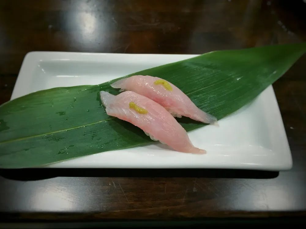 Two pieces of Nodoguro sushi