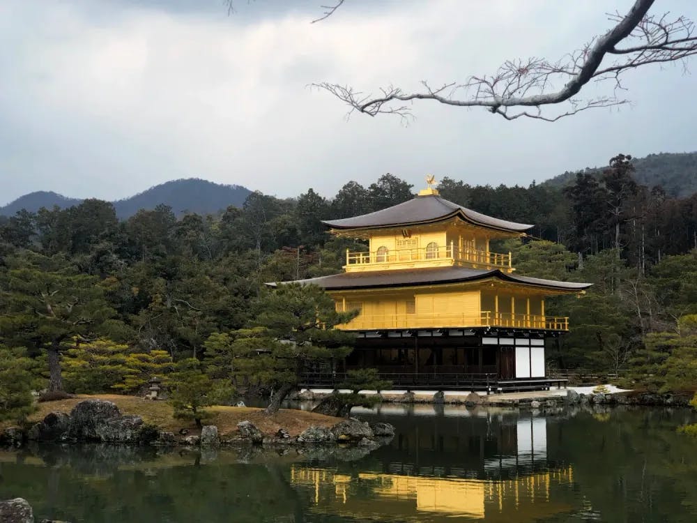 Exterior of the Golden Pavilion overlooking a pond in Kyoto, Kyoto Prefecture