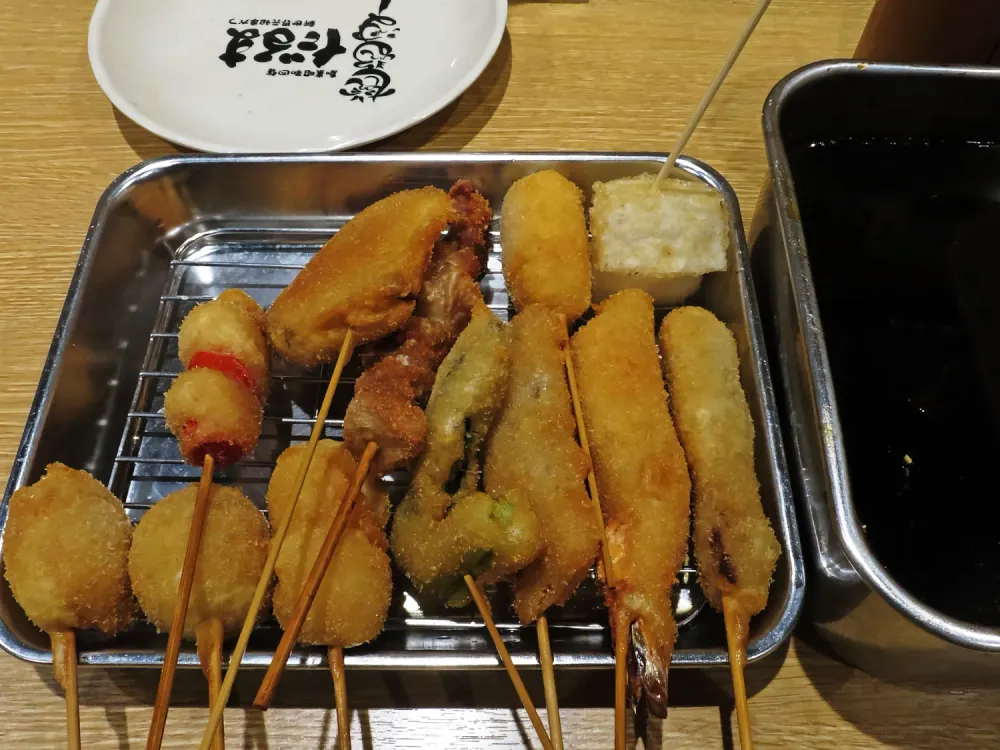 Kushikatsu skewers on metal tray