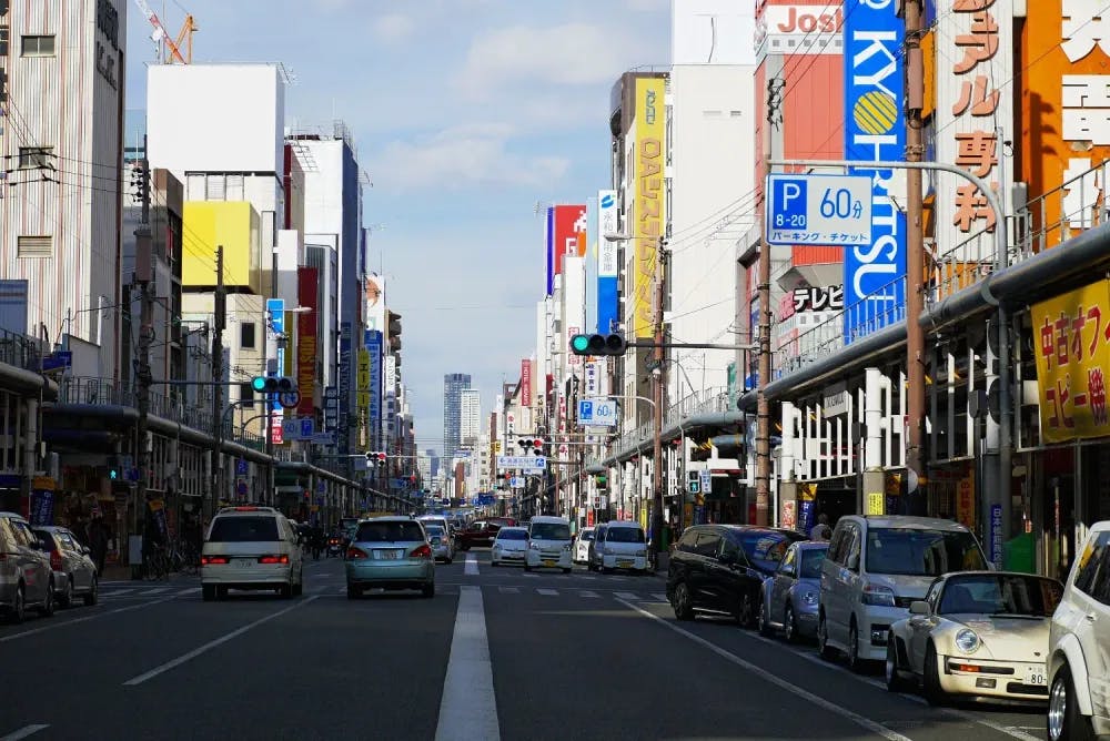 Cars lining the streets of Den Den Town in Osaka, Osaka Prefecture