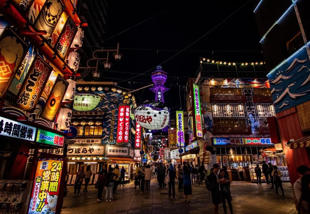 Busy streets of Shinsekai at night in Osaka, Osaka Prefecture