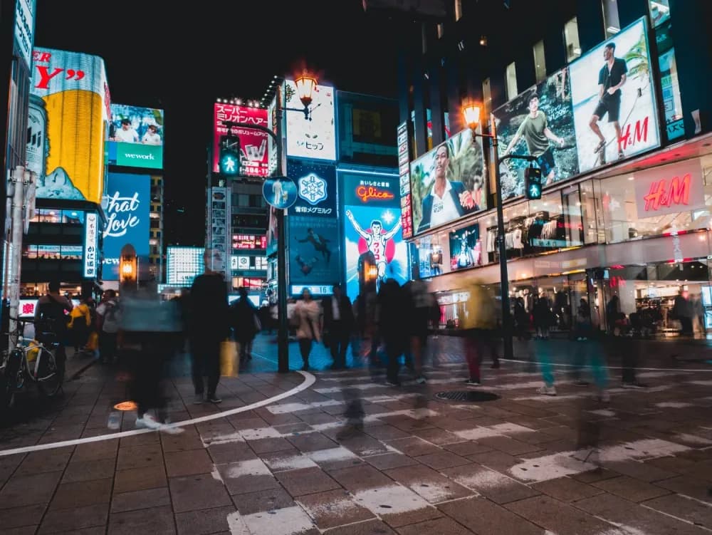 People crossing the street towards Ebisubashi in Osaka, Osaka Prefecture