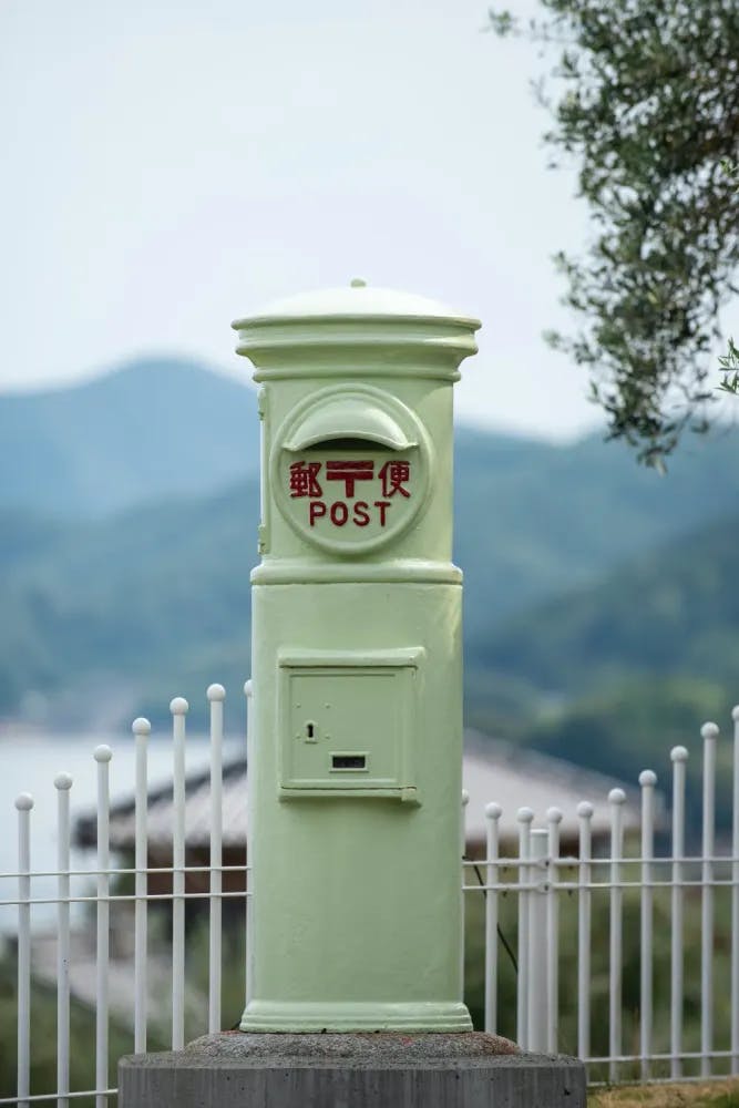 Olive-colored post box at Shodoshima Olive Park